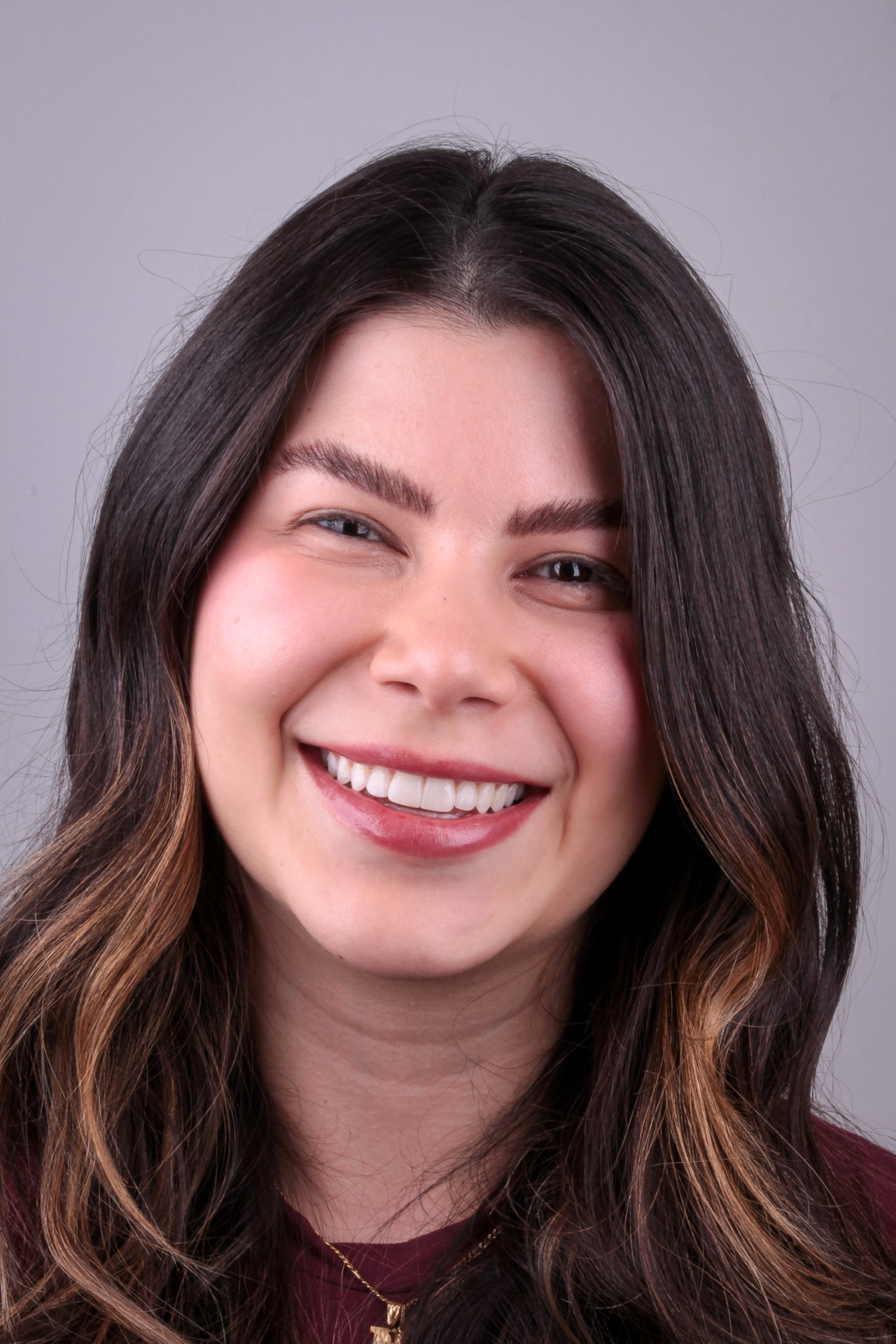 Sorriso reabilitado — vista frontal